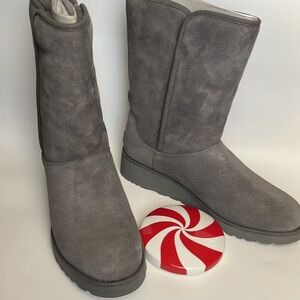 Amie has plush sheepskin w/ wedge. Pretreated to repel water & stains; 1.5" heel